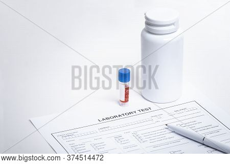 Form To Fill In With Results Of Blood Test In Tube, Pen And Drug Bottle