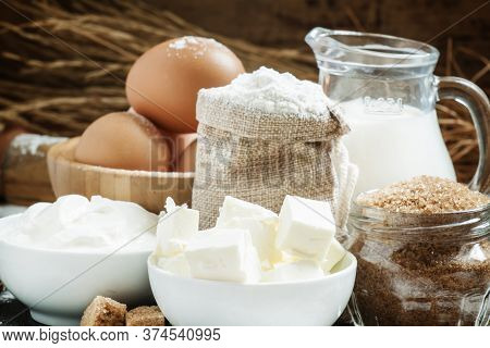 Ingredients For Baking  As Milk, Butterm Flour, Eggs And Other In A Country Style, Selective Focus