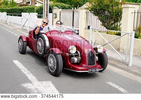 Bordeaux , Aquitaine / France - 06 20 2020 : Lomax Red Car Vintage Roadster Oldtimer In Street From 