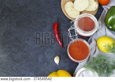 Aivar Caviar In A Glass Jar And Ingredients For It - Sweet Pepper, Tomatoes, Garlic, Hot Pepper, Dil