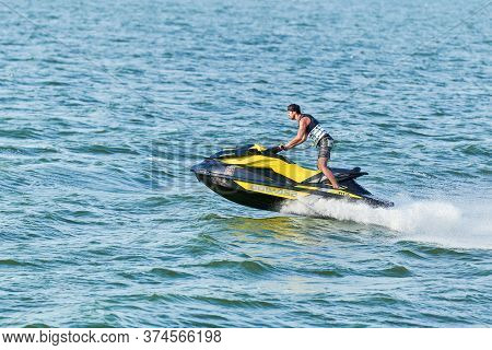 Voronezh, Russia - 23.08.2019 - Man On Water Scooter. Summer Vacation On Personal Watercraft In Trop