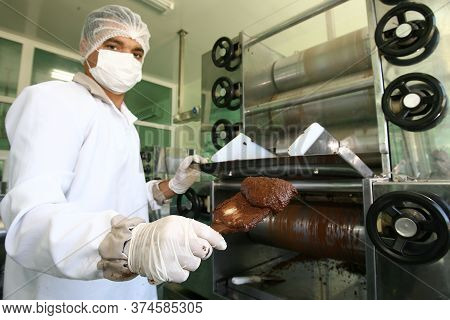 Ilheus, Bahia / Brazil - August 7, 2011: Employee Is Seen In A Chocolate Gurmet Factory In The City 