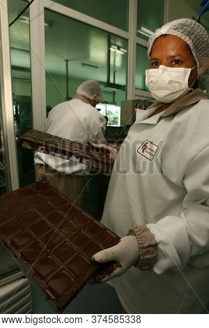 Ilheus, Bahia / Brazil - August 7, 2011: Employee Is Seen In A Chocolate Gurmet Factory In The City 