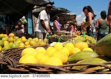 Conde, Bahia / Brazil - September 7, 2012: Melons, Papayas, Oranges Are Seen For Sale At A Free Mark