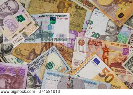 Multicurrency Background Of Euros Us Dollars, Russian Rubles, Egyptian Pounds And Ukrainian Hryvnias