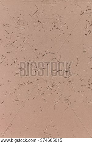 Vertical Beige Painted Plastered Wall With Scratches