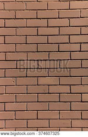 Brown Painted Brick Wall. Vertical Brick Background