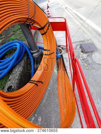 Orange Pipe For Laying The Optical Fibers To Connect Companies And Families On The Internet At High 