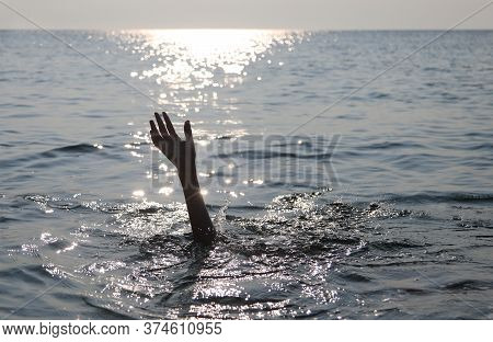 Hand Of A Drowned Person On The Sea
