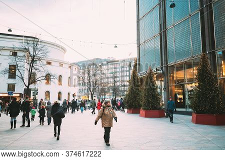Helsinki, Finland - December 10, 2016: People Walking Near Stockmann Department Store On Aleksanteri