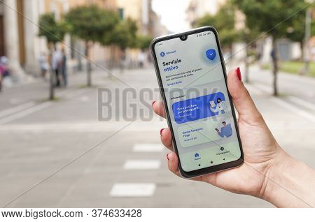 Carrara, Italy - July 03, 2020 - Woman Check The Contact Tracer App Immuni, Developed For The Italia