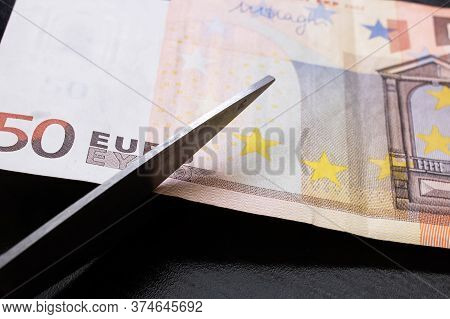Scissors Cut A Euro Bill Close Up