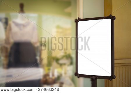 Blabk Shop Promotion Sign Is Placed Outside The Clothing Store