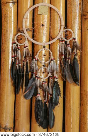 Real Native Dream Catcher On Pure Natural Wooden Background