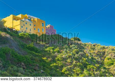 View On Mountain And Colorful Buildings On The Top In Punta Brava, Puerto De La Cruz, Tenerife, Cana