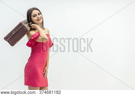 Young Old-fashioned Female In Summer Outfit Sitting Holding A Retro Suitcase Ready For Increadible V