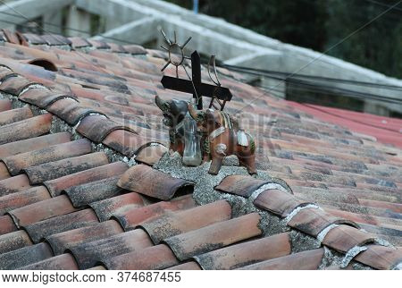 The Pucara Bulls On A Roof Of Peru, This Is Their Name, Hide A Story Made Of Protection, Happiness A