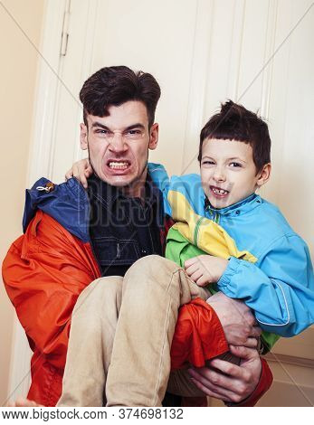 Faher And Son Together Having Fun At Home, Lifestyle Happy Family, People At Home