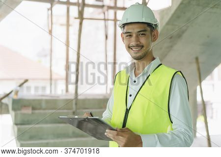 Builder Inspection Consultancy. Inspector Checking Material And Structure In Construction.