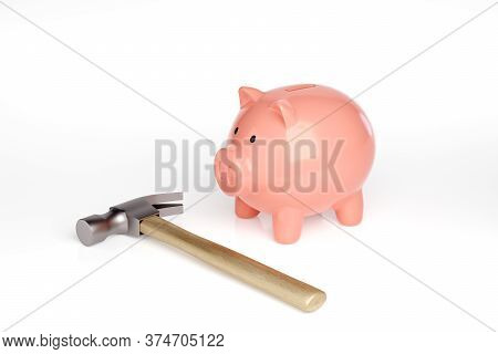 Piggy Bank Next A Hammer. 3d Illustration