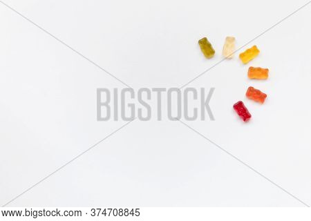 Jelly Bears Lie On A White Background