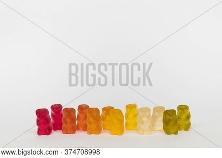 Jelly Bears Stand On A White Background