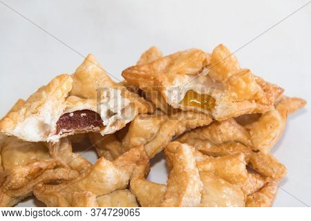Fried Pastry With Quince And Batata Typical Of South America Gastronomy