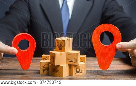The Businessman Indicates The Points Of The Route Of Supply And Delivery Of Goods. Distribution. Tra