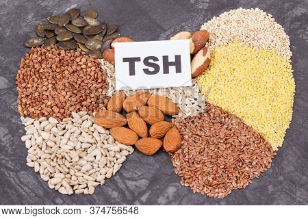 Inscription Tsh And Thyroid Shape Made Of Healthy Ingredients. Source Natural Vitamins And Minerals