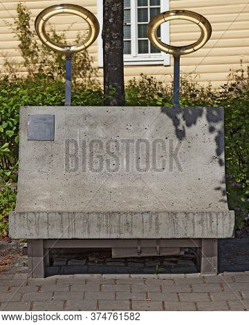 Umea, Norrland Sweden - June 21, 2020: Park Bench As An Art Project With A Halo Above The Head