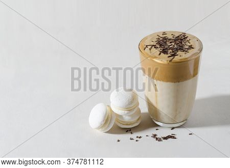 Korean Coffee Dalgon In A Tall Glass Glass Close-up Top Sprinkled With Chocolate Pastry Topping. Nea