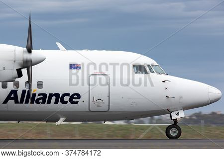 Avalon, Australia - February 28, 2015: Alliance Airlines Fokker 50 Regional Airliner Aircraft Taxiin