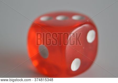 Red Plastic Arcylic D6 Six Sided Die Dice Close Up Variable Focus