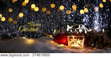 Christmas Theme With Candles, Snow, Pine Cone And Christmas Light