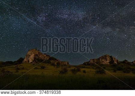 Clear Spangled Sky Above Cliffs At Night