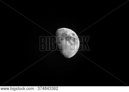 Detailed Image Of The Half Moon. Beautiful Half Moon Isolated On The Black Clear Sky
