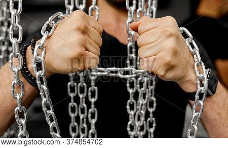 Mens Hands Try To Break The Chain Test For Strength
