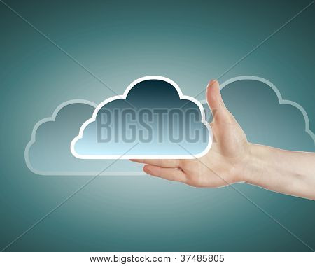 Hand med cloud computing symbol mot färg bakgrund
