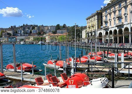 Lugano, Switzerland - April 17, 2018. Embankment Of The Lake Lugano In City Of Lugano On A Spring Su