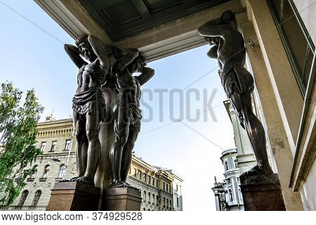 Saint-petersburg.russia.june 17, 2020.atlanteans At The Building Of The New Hermitage In St. Petersb