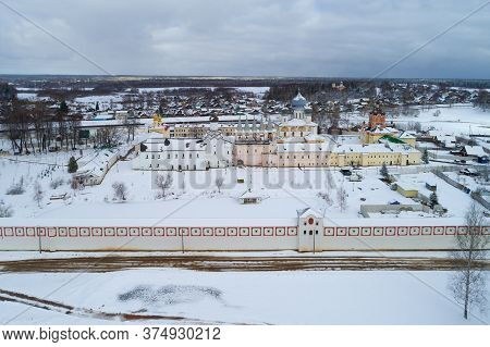 Above The Tikhvin Theotokos Assumption Monastery Is An Overcast March Day (aerial Survey). Leningrad