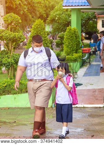 Kanchanaburi,thailand-july 2,2020:thai Students Wear Various Medical Masks To Prevent Themselves Fro
