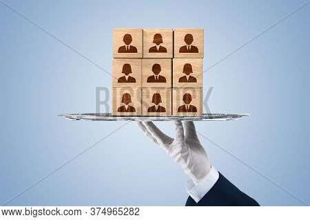 Human Resources Team On A Silver Platter - Human Resources Services Concept. Hand Holding Silver Pla