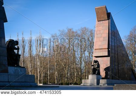 Berlin, Germany - March 28, 2023: Monument To A Soviet Soldier With A Sword Holding A German Child A