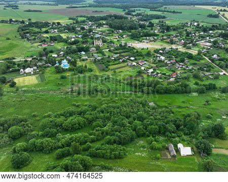 Village Wooden House. Country Houses In Countryside, Aerial View. Rural Building And Farmhouse In Co