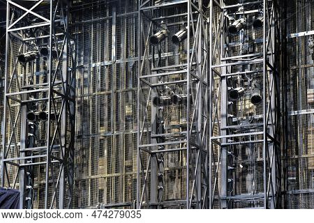 Technical Equipment At The Backstage Of Theater. Stage Spot Lighting Rigging Structure For A Theater