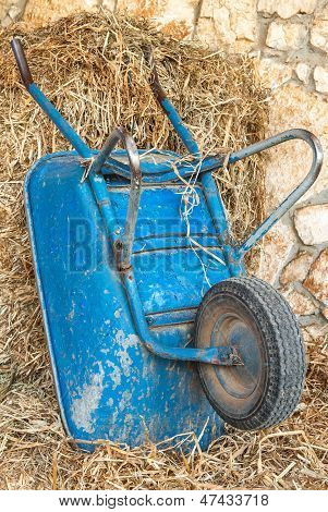 A Wheelbarrow Standing Vertical