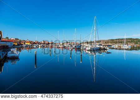 Harbor With Boats In The City Fjaellbacka In Sweden.