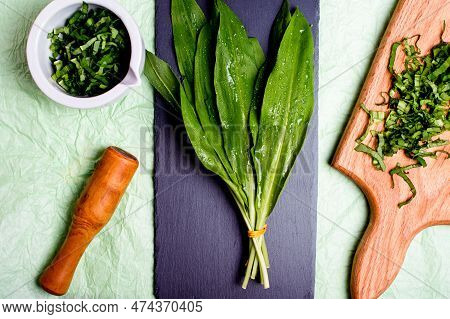 Wild Garlic. Wild Garlic On A Black Board On A Green Background.