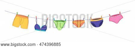 Hanging Underwear. Mens Underwear Clothing On A Clothesline, Women Intimate And Sexy Clothing On A R